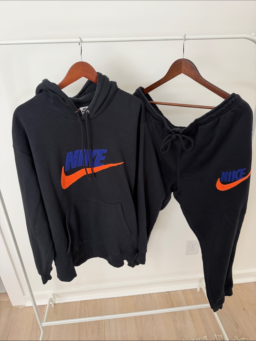 Nike Black Hoodie & Joggers Set with Blue Logo and Orange Swoosh